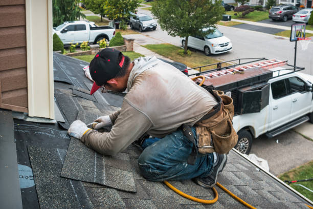 Professional Emergency Roof Repair technician working in Carlisle, MA